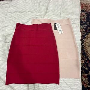 Three Bebe Women's Skirts.   Two never worn!   Black worn 2x. Pink and red new!